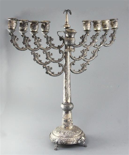 A late 19th/early 20th century large continental repousse silver Hanukkah Menorah, 69cm.